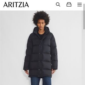 Brand new, never worn Aritzia black midi Super Puff